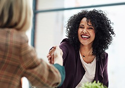 Woman smiling at job interview